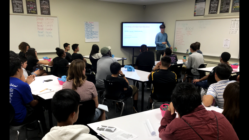 Figure 1: Students look on to my presentation as they learn about engineering design